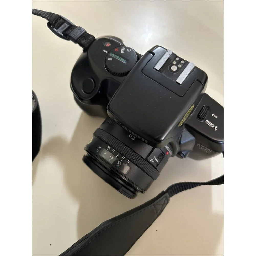 Canon EOS 750 SLR Camera with 35-55M Lens w/ Extra Sigma Zoom -a Lens 35-135mm